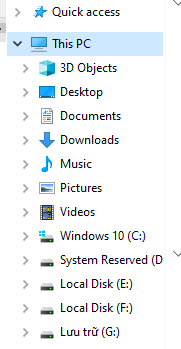Cây ổ đĩa trong This PC, chọn ổ E: không phải ổ hệ thống
